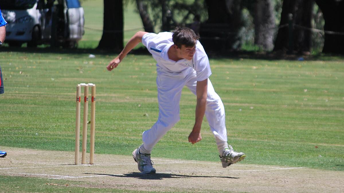 BLUES: Nick Corbett bowling for the Young Blues earlier in the season.	             (sub)