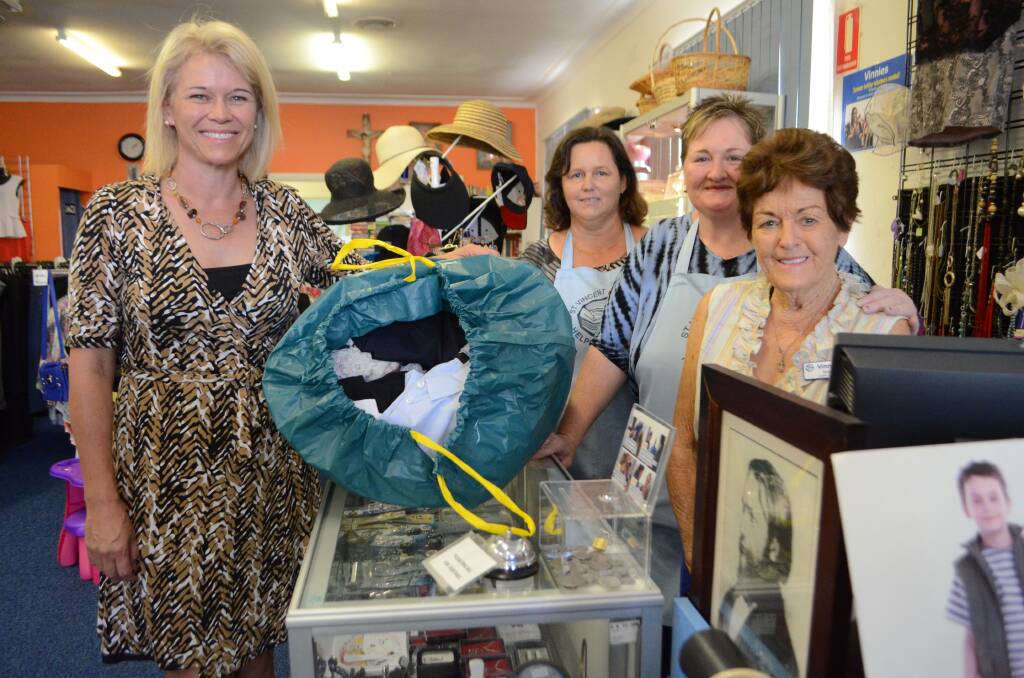 EXCITING TIME AHEAD: Member for Cootamundra Katrina Hodgkinson visited St Vincent de Paul volunteers Joanne Bourke, store manager Bronwen Grovenor and Marie Waugh, to congratulate them on receiving the keys to their new location in Lovell Street.							(vinniesexpand1)