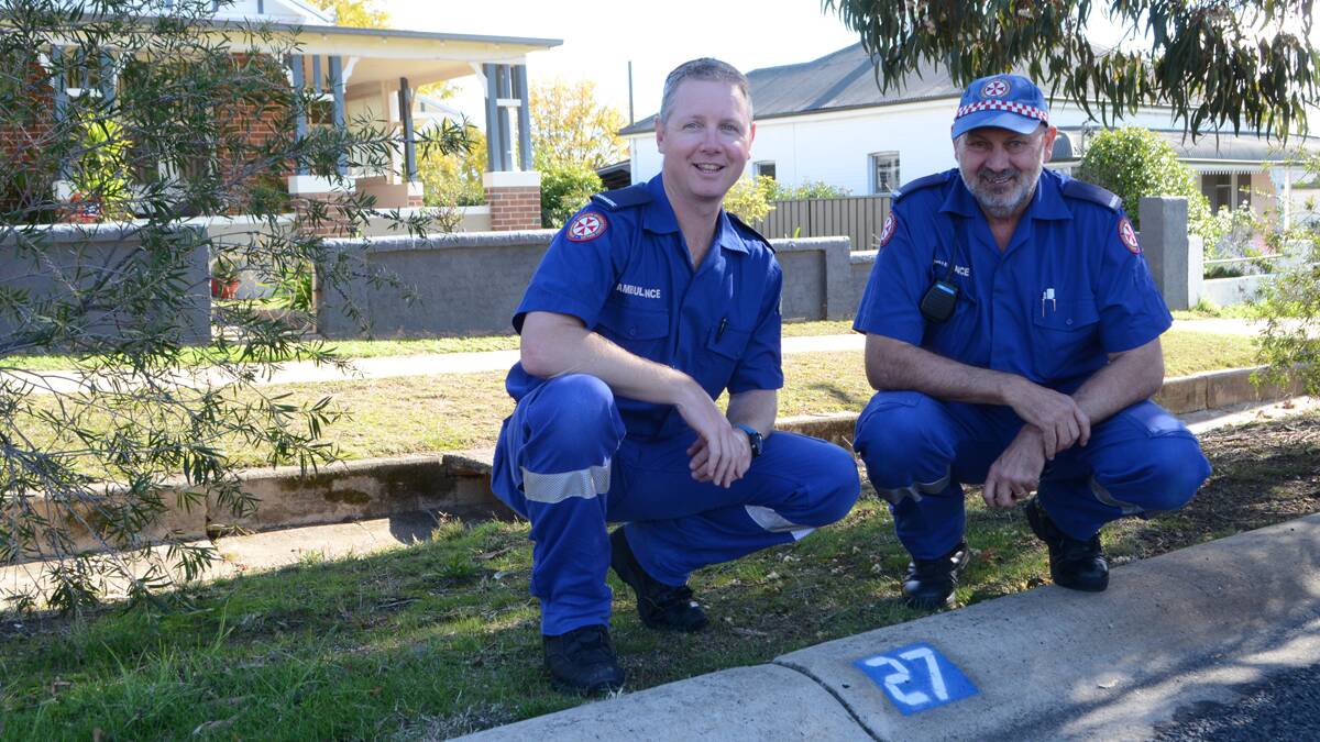 STREET NUMBERING: Young paramedics Aaron Moloney and Des Daley welcome council’s push for the upgrade of street numbers. They said consistant street numbering will be handy at 2am when emergency services are looking for an address. 		                      (streetnumbers (1))