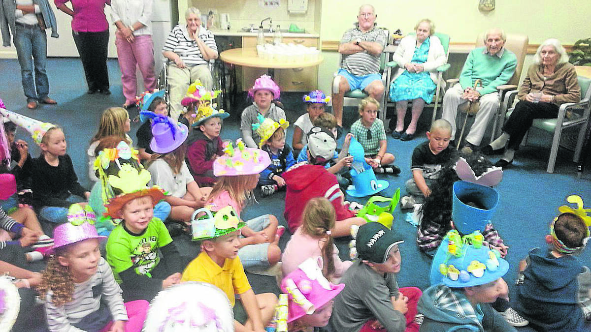 ABOVE: Young Public School’s KE and 2M classes singing to patients at Mercy Care.                      (sub)
