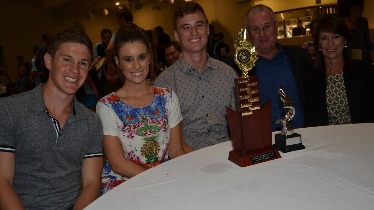 SPORTS DINNER: Phil Webb, Anna and Brad Maxwell, and Greg and Donna Maxwell.