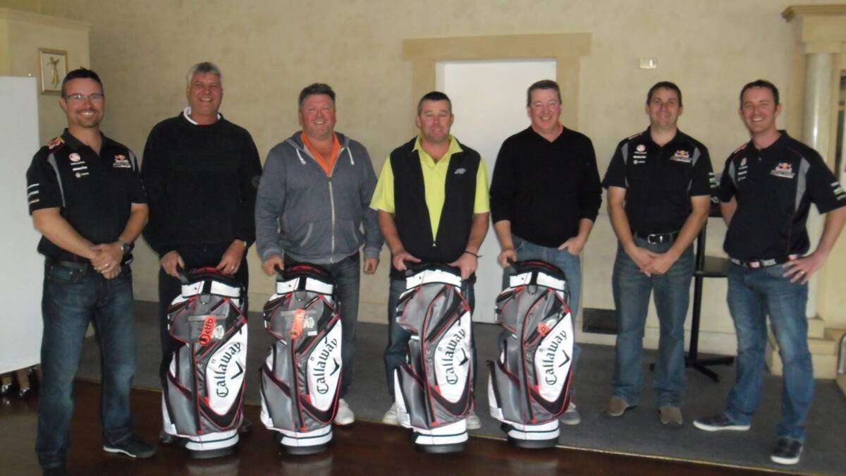 SCRAMBLE: Harden Geelan Holden’s Jamie Harden (left) and Greg Hennock and Mark Apps (right) with the winning team of Craig Chapman, Ian Page, Steve Dewar and Ian Broderick.  			     (sub)