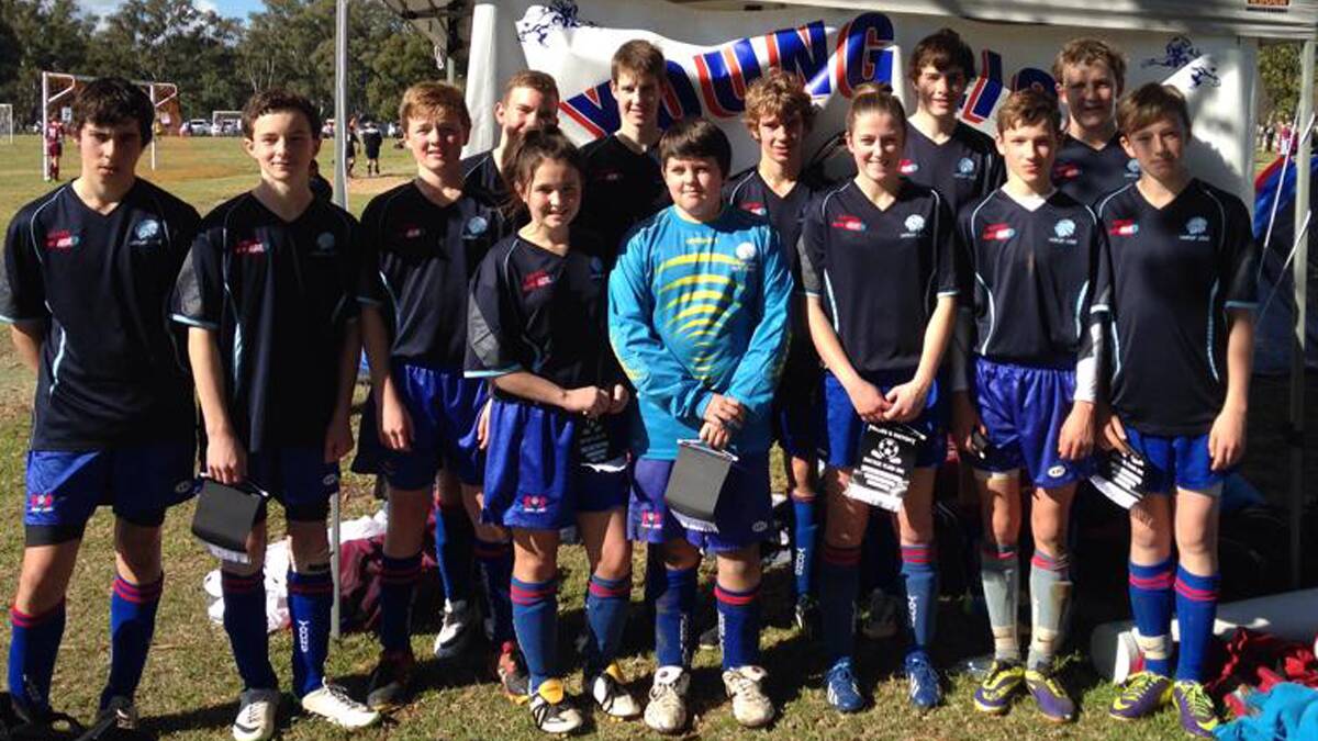 CARNIVAL: The Donges Supa IGA Under 15s soccer team pictured at Forbes where they took part in the town’s annual soccer carnival. 								    (sub)