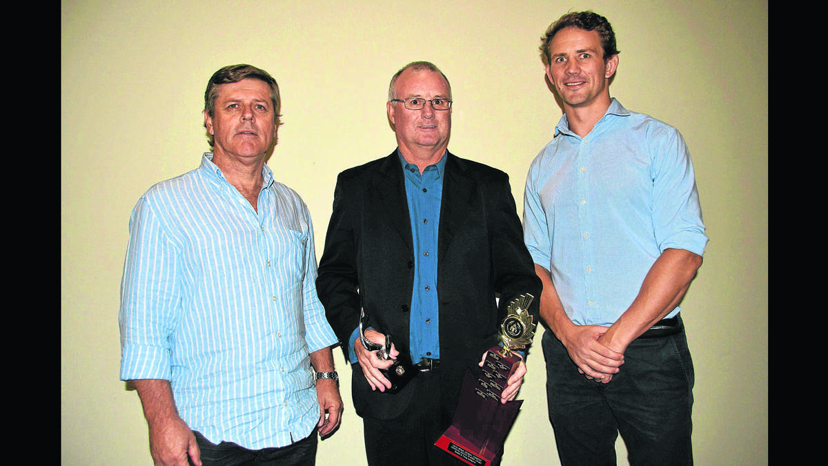 2013 CONTINUING SERVICE TO SPORT: Sponsor Mark Johnson (left) and special guest Tim Davidson (right) present Greg Maxwell with his award.              (sportpres011)