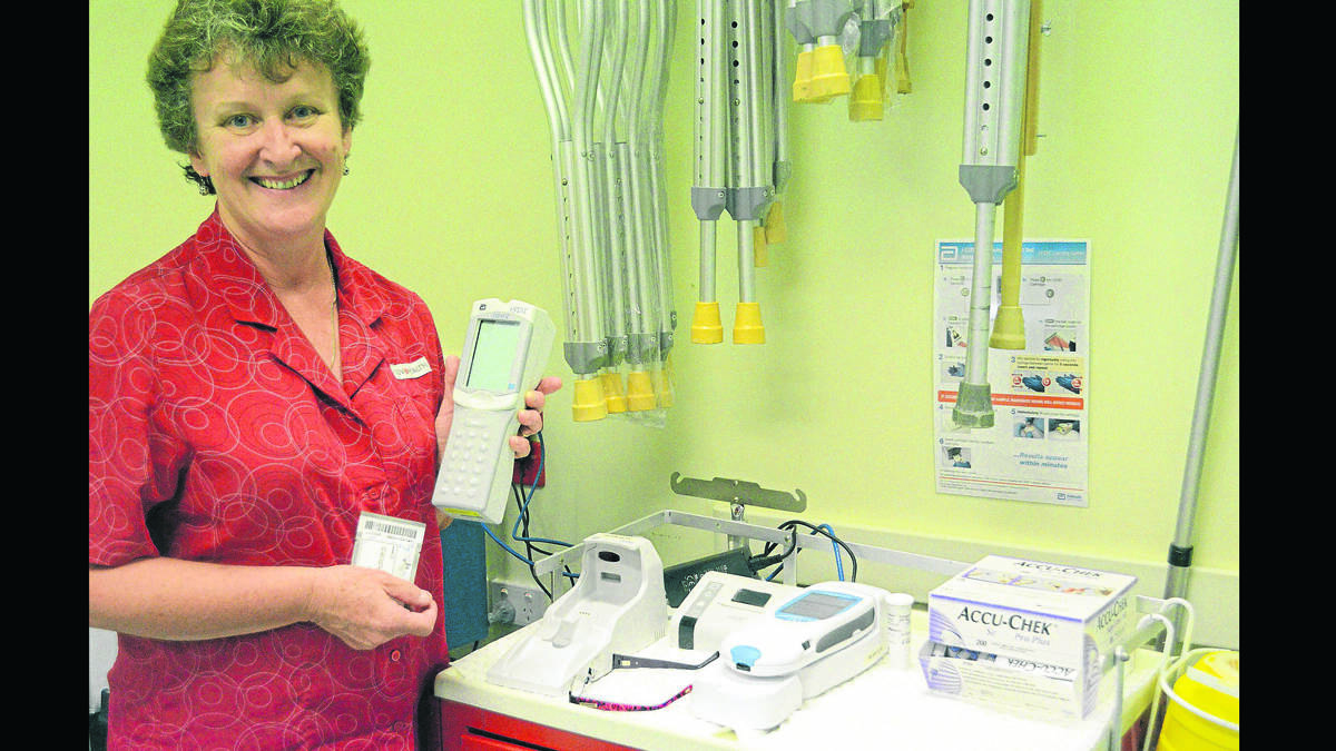 faster: Registered nurse Vicky Coddington recently trained to use the new equipment at Young Hospital ED.