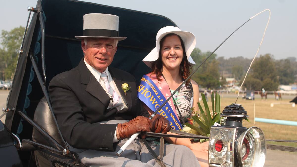 ENCOURAGING OTHERS: 2013 Cootamundra Showgirl Ellie Morton and local carriage driver Garry Harris were first out in a lap of the showground following last year’s Showgirl announcement. Ellie is calling on all interested girls to consider entering this year’s Showgirl competition.