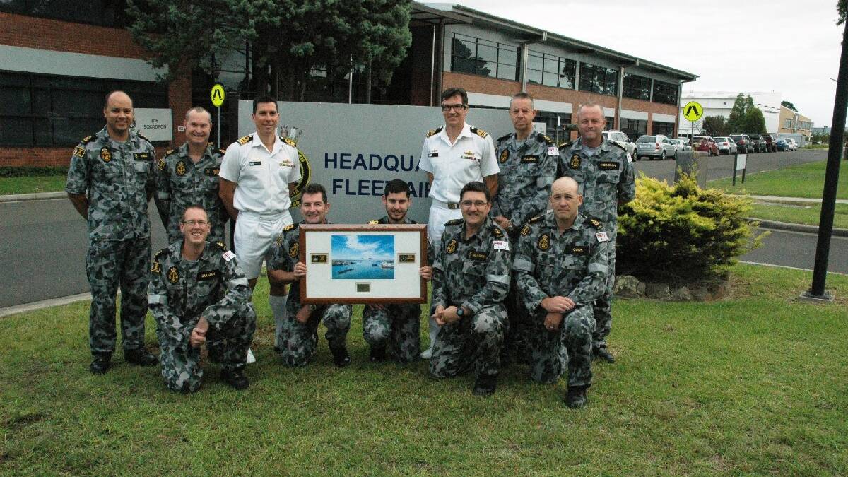 VISITORS: From HMAS Albatross for Friday’s Anzac Day services in Young are (back, left to right) PO Herbert Field, CPO Gary Pybus, CMDR Cliff Kyle, LCDR Simon Levy, CPO Chris Williams, PO Greg Hodgson. Front, left to right: LS Steven Zillman, LEUT Ian Donovan, LEUT David Sinclair, LS Scott McLaren, PO Jason Cook. 