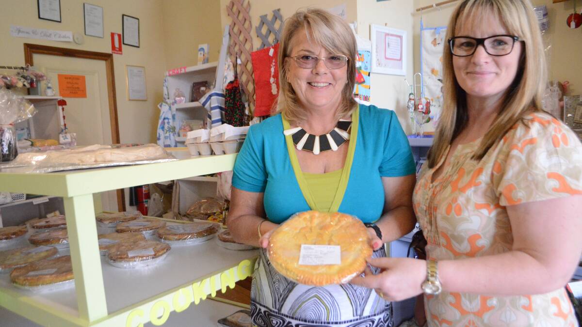 CHERRY FEVER: The Young Country Women’s Association shop in Boorowa Street only had two pies remaining from their Cherry Festival cook-off by the time shopkeeper Joanne Anderson showed local woman Wendy Dewar around the store on Saturday morning.