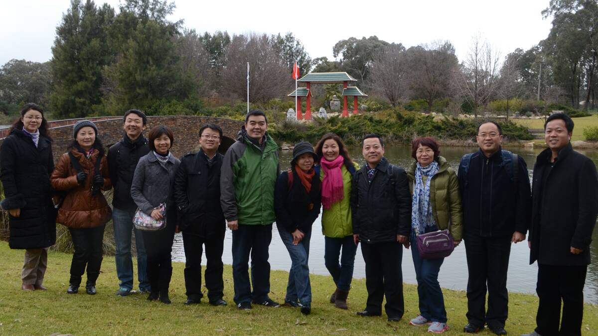 This group of academics enjoyed the Chinese Tribute Gardens, particuarly the water wheel which is significant in Chinese culture.