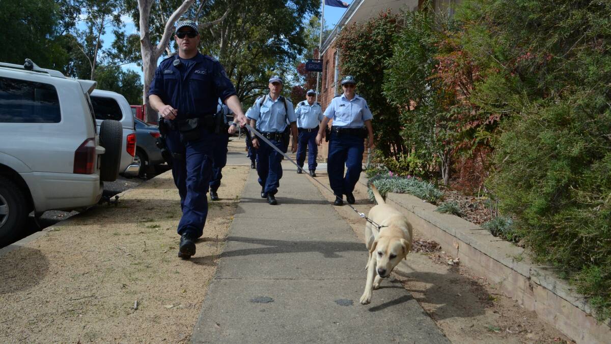 NOTICE: Police were out in force yesterday in a crack-down on drugs in the area. They were led by a sniffer dog from Wagga. 