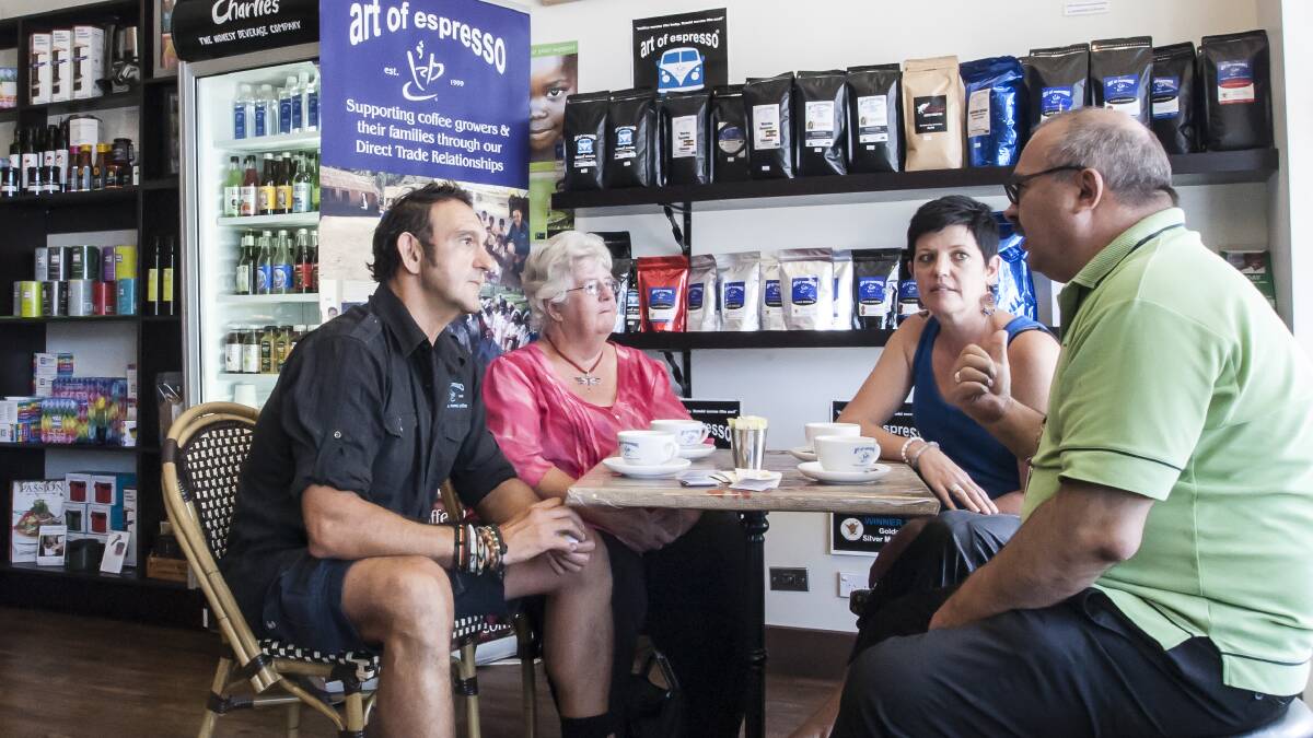 Art of Espresso owner Adrian Capra, Sue Fenning from the Hilltops Suicide Prevention Network, Melissa Anderson from Art of Espresso and Young Shire Council’s general manager Peter Vlatko come together to organise a special information session for the community. Photo: supplied