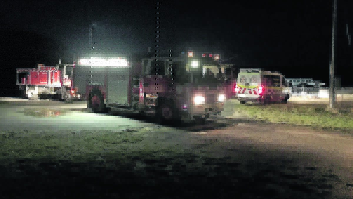 Emergency services crews at Young Airport on Monday night.