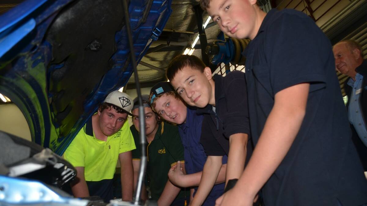  Year 10 Young High School students (left to right) Beau Reynolds, Bronson Piercy, Riley Edgerton, Nenad Jelinek and Bailey Martin loved Young TAFE’s first automotive workshop.