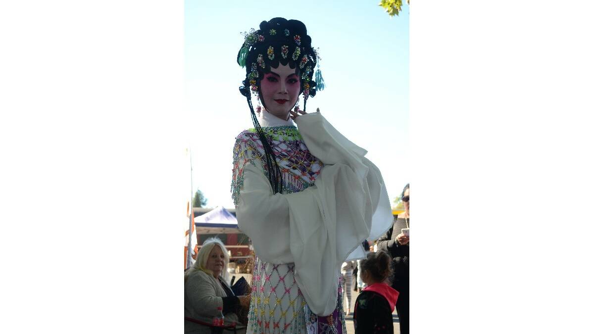 Chinese performer Gabby Chan in full costume after giving festival patrons a taste of the Chinese opera production Life’s a Stage.