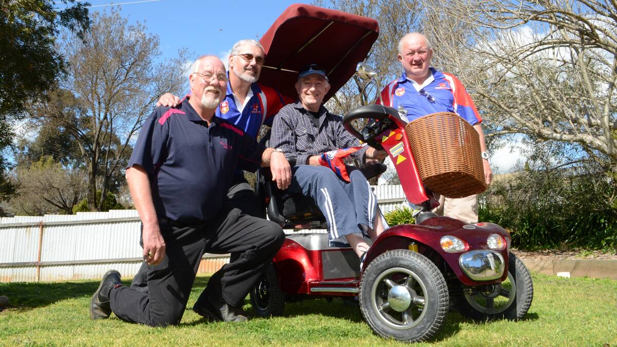 A group of strangers came together to give local man Colin Edgar his independance back. Donald Luff (kneeling), Steven Convery of Newcastle, Colin Edgar and John Davey of Newcastle all played a part in the random act of kindness. 	