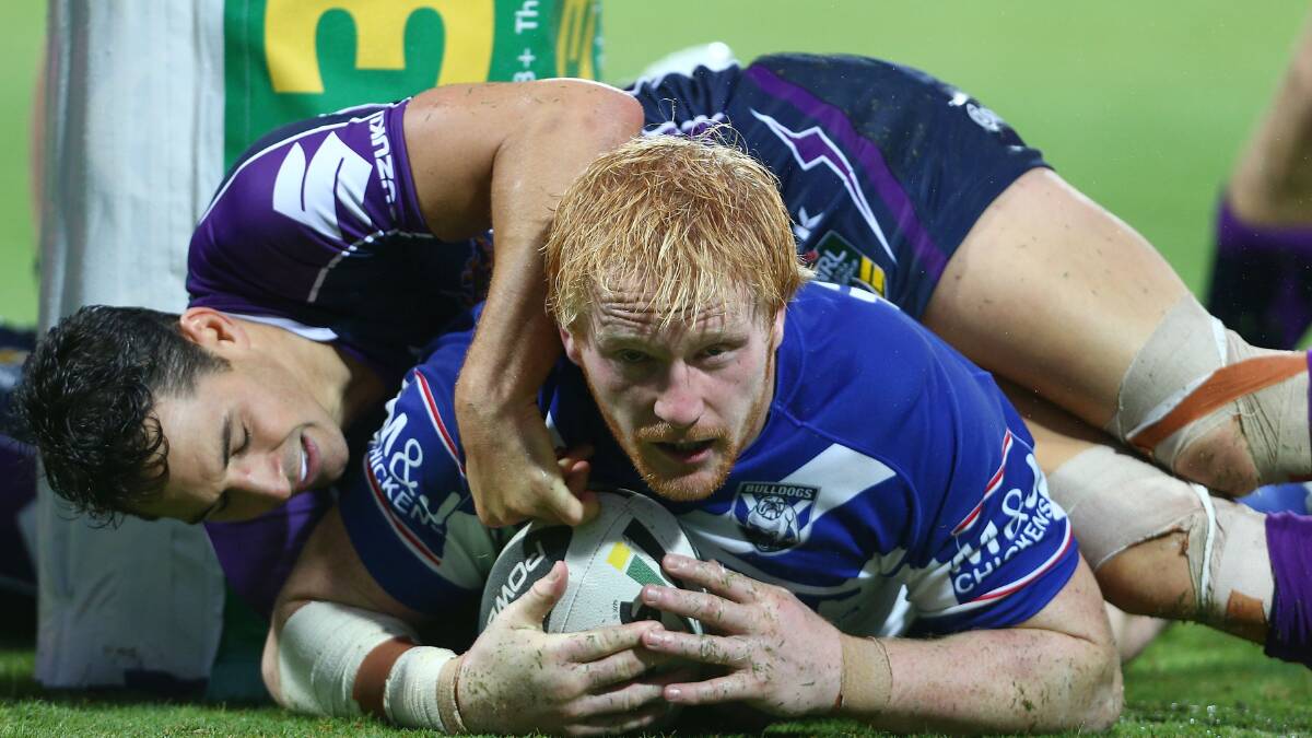 Dejected Storm players Ryan Hoffman, Ben Hampton and Will Chambers during the round four NRL match between the Canterbury-Bankstown Bulldogs and the Melbourne Storm in Perth. Picture: Getty