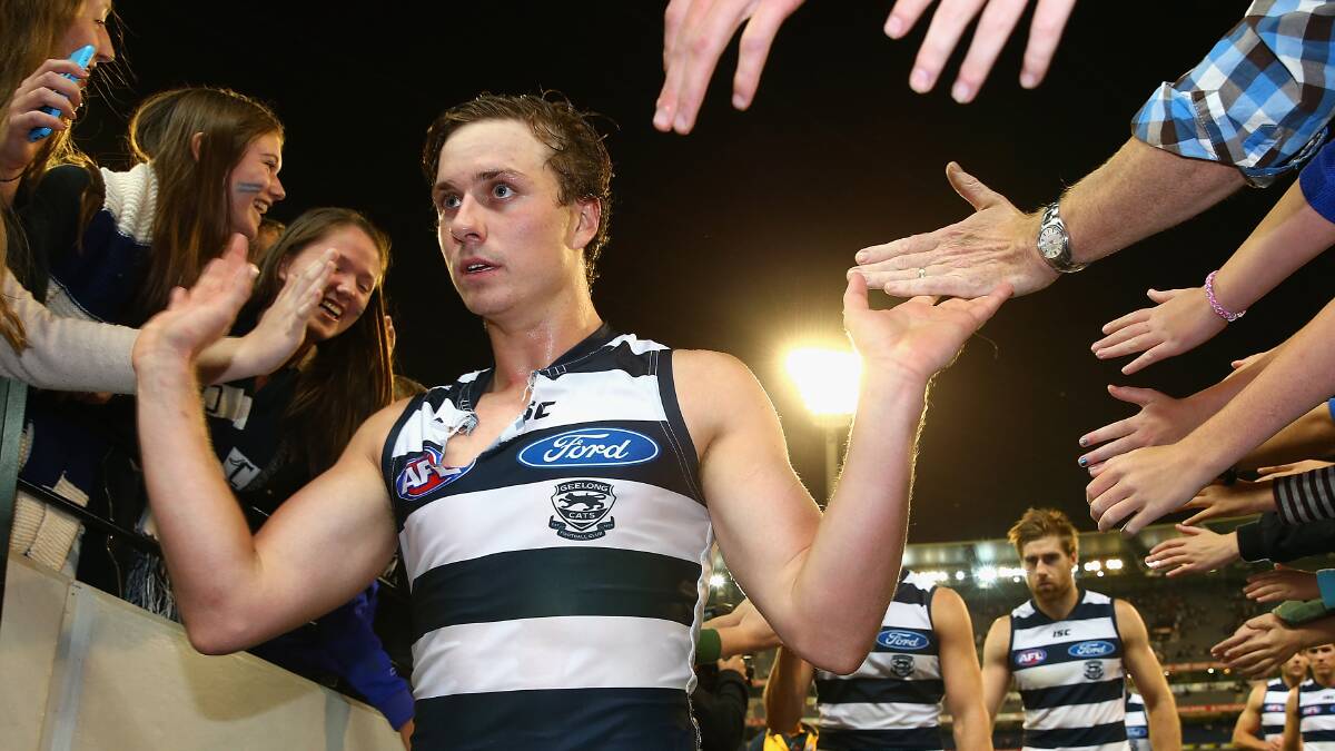 Mitch Duncan of the Cats high fives fans after winning the round three AFL match at the MCG. Geelong ran out 87 points to Collingwood's 76. Picture: Getty Images