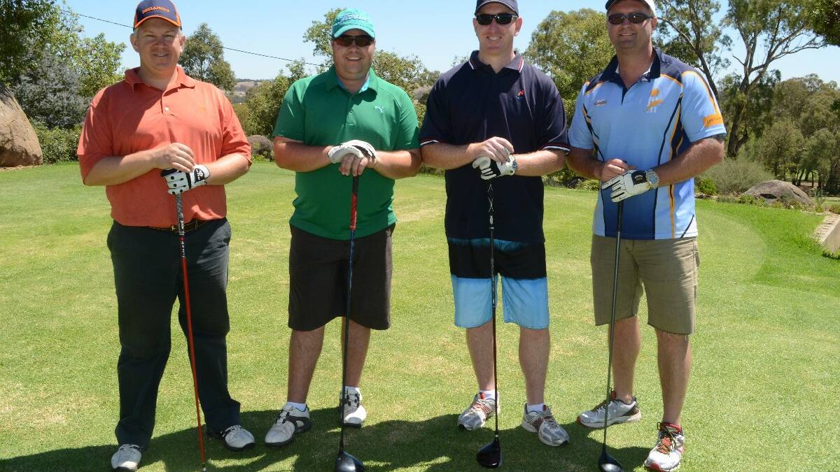 THE BOYS: Cootamundra Police officers Luke Ismay, Bill Heather, Dan McGrath and Mal Sutherland swapped the indoors for the outdoors last Friday to help raise money for local emergency services.