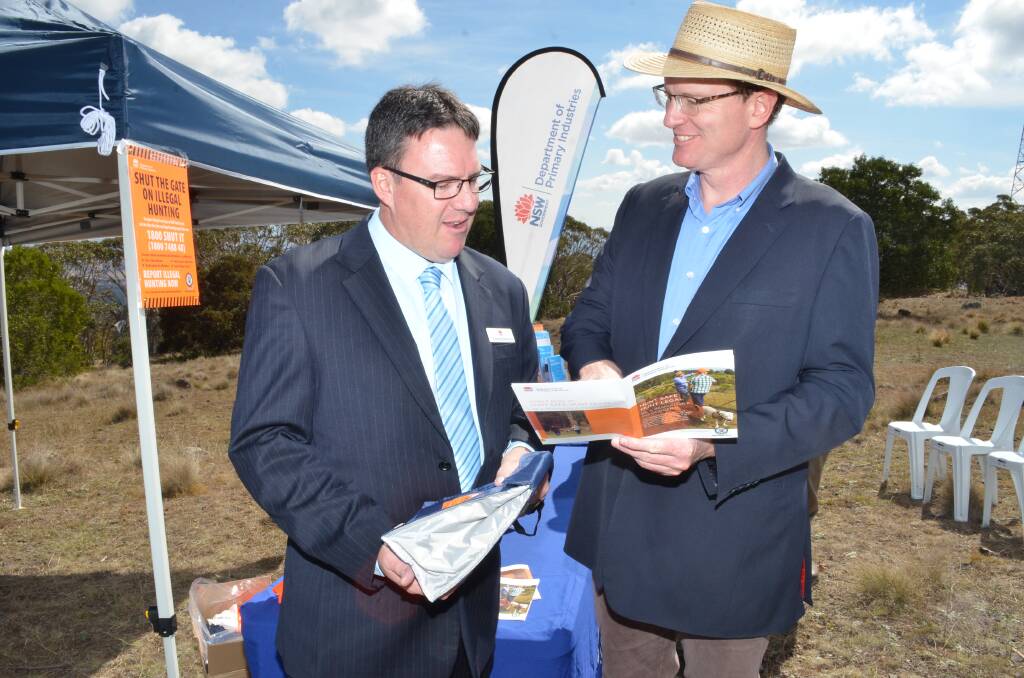 NEW GUIDE: DPI director of game licensing Andrew Moriarty and member for Orange Andrew Gee this week launched an new information guide to being a responsible pig hunter.  