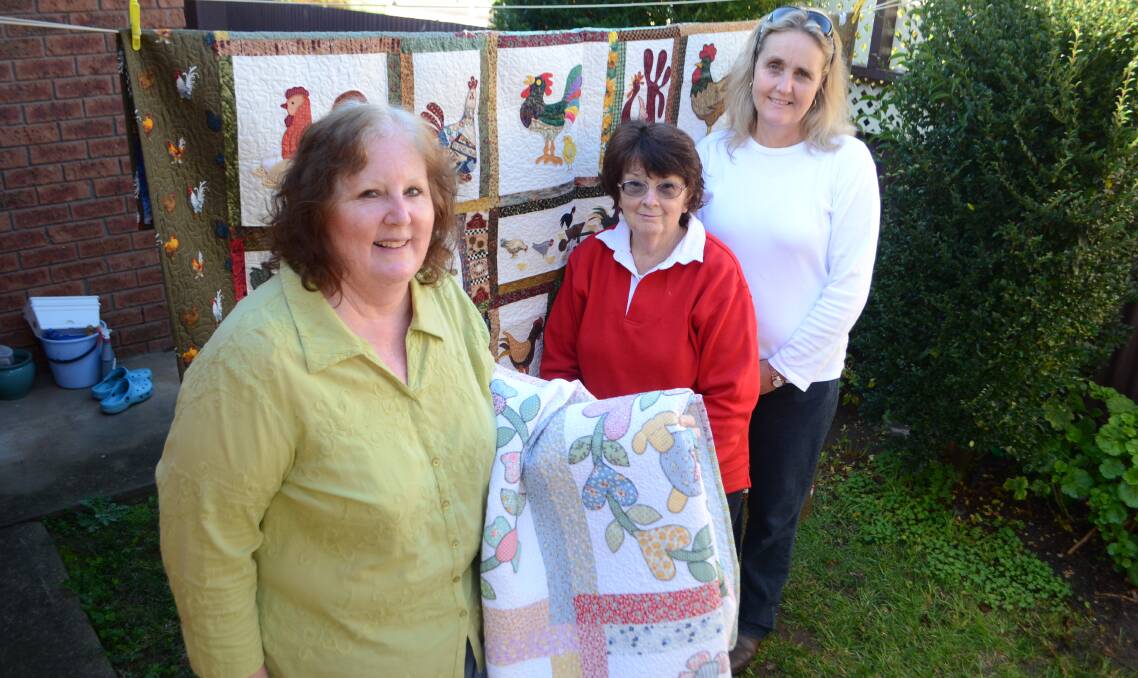 CHUFFED: Quilt Show organisers Jenny Tate, Honey Harrigan and Betty Smithers are chuffed to host special guest Elaine Rose. 