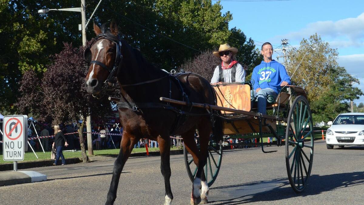 RIDE: Shane Smith enjoyed a ride around the block on a horse and cart. 