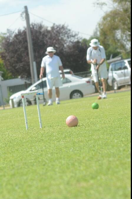GAME: John James from Deniliquin and Derrick Christopher from Wollongong during their singles match at Jack Bond Field.