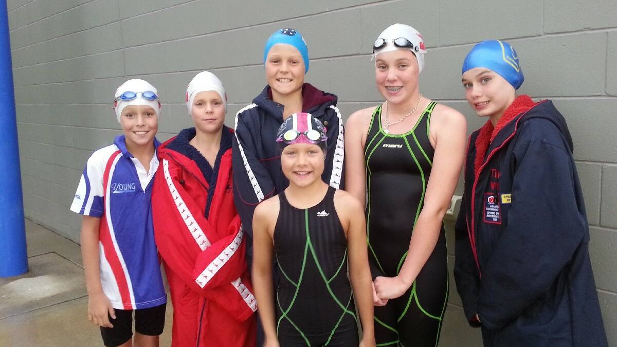 OFF to Homebush: Young Swimming Club members (back)  Duke Smith-Maloney, Cameron Hennock, Nelson Hall, Jazmine Hennock and Matilda Metcalfe and (front): Abbey Hall will compete in the Speedo Sprint State final this weekend..