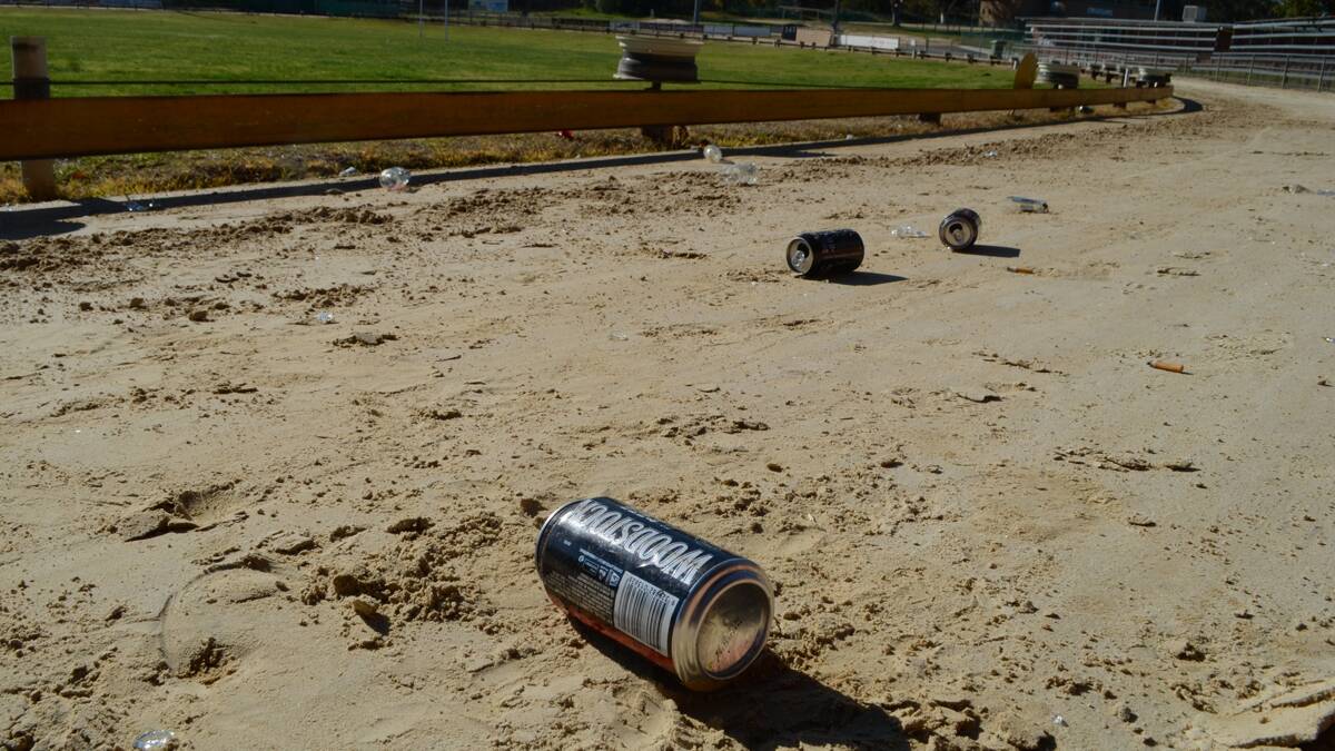 MAD: Monday celebrations in Young went a little too far when Young Cherrypicker players allegedly began smashing bottles on the greyhound track at Alfred Oval.