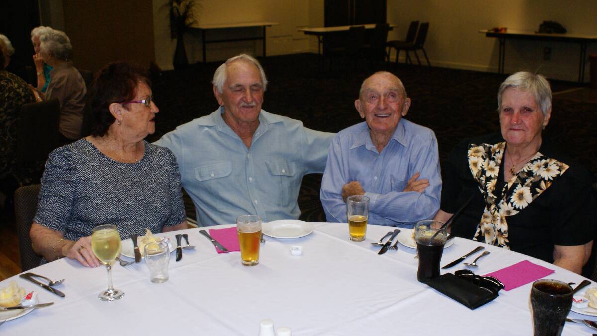 FRIENDS: Joan Saunders, Robert Stone, Don and Glad Hancock at the Seniors luncheon.