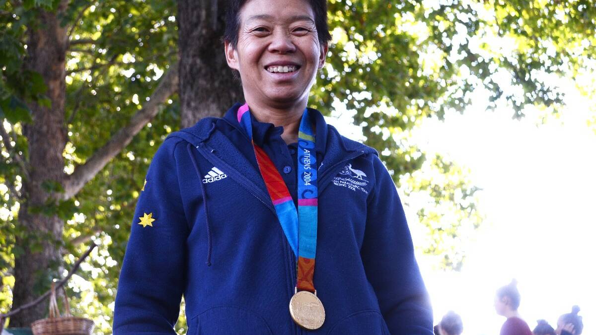 GUEST: Chinese Australian paralympic gold medallist Lindy Hou with her gold medal from Beijing.