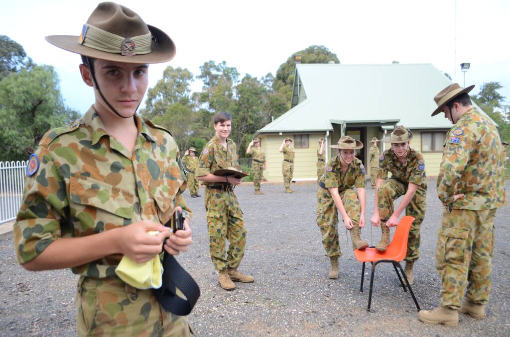 Young’s army cadets Kai O’Rouke, Cadet Corporal Jakob Byrne, Rachel McRaye, Baye Bruce and Cadet Sergeant Thomas Morton getting ready for the eight Anzac services they’ll participate in tomorrow.    