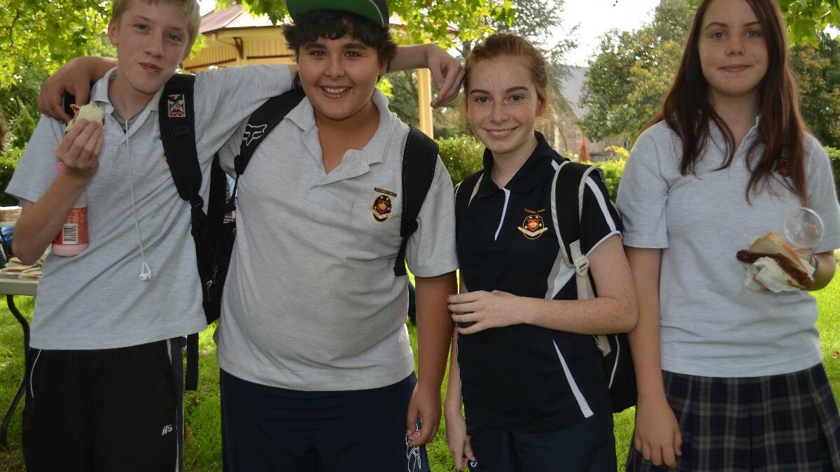LUNCH: Snacking on some sausage sandwiches were Young High students Jayden Smart, Damien Korakledski, Abbie Dunshan and Molly Craggs-Unwin.