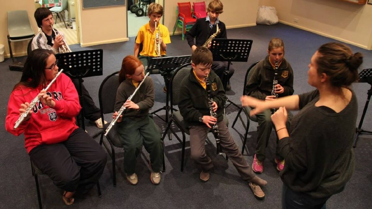 YOUTH BAND: Young & Regional School of Music Youth Band members (back) Nick Stokell, Henry Dowling, Jack Lochhead, (front) Emily Tredinnick, Isabelle Grainger, Isiah Hines and Rachel Walker with their conductor Leisa Kenny. 