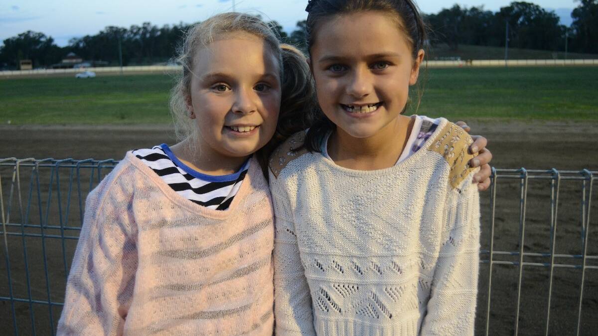 NEIGHBOURS: Hanging out at the Carnival of Cups event were nine-year-old Young neighbours Michaella Martens and Ella McGregor.