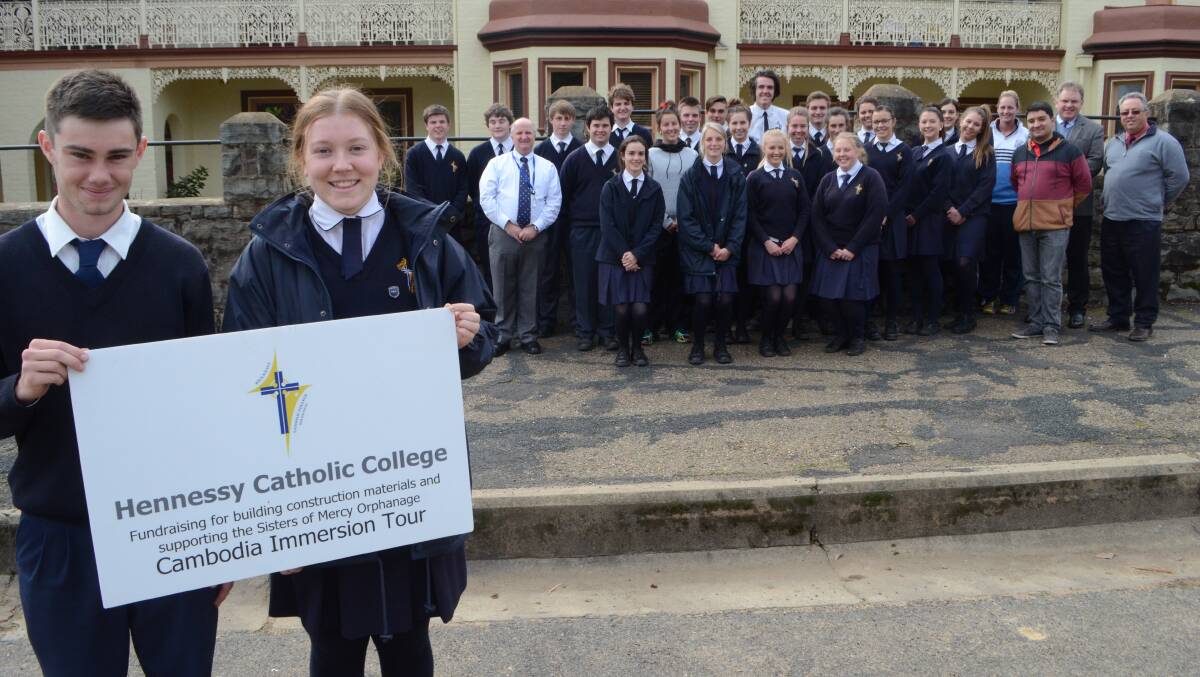 BON VOYAGE: Hennessy Catholic College Year 11 students Tim Maloney and Bridget Parkman, and 30of their fellow classmates and teachers embark on a journey to Cambodia today to help poverty-stricken communities.  