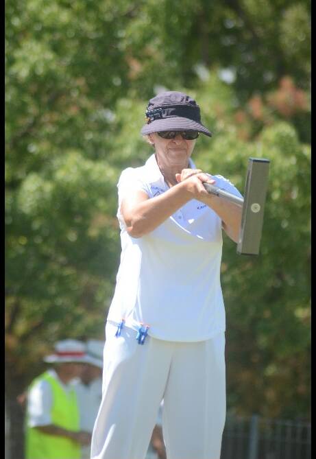 CONCENTRATION: Kaye Moffat of Albury analyses her next shot.  