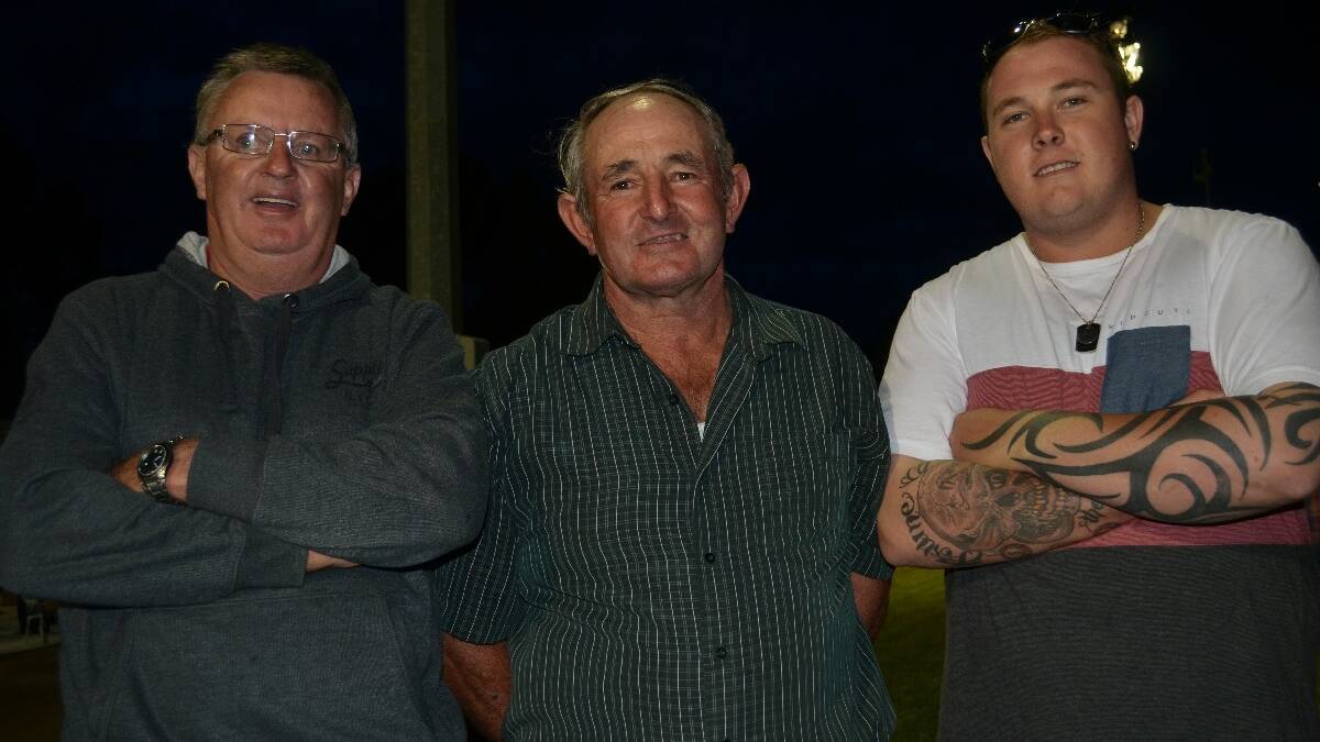 NIGHT OUT: Wayne Long of Young, John and Justin Downey, both of Parkes.