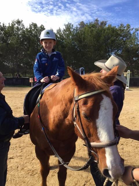 WHAT A WIN: Young North Public School’s Jayden Jessop is among the students celebrating a state win when the school joined forces with Young’s Riding for Disabled Association to take out the Drill Ride to Music section in the Australian Musical Ride competition.              