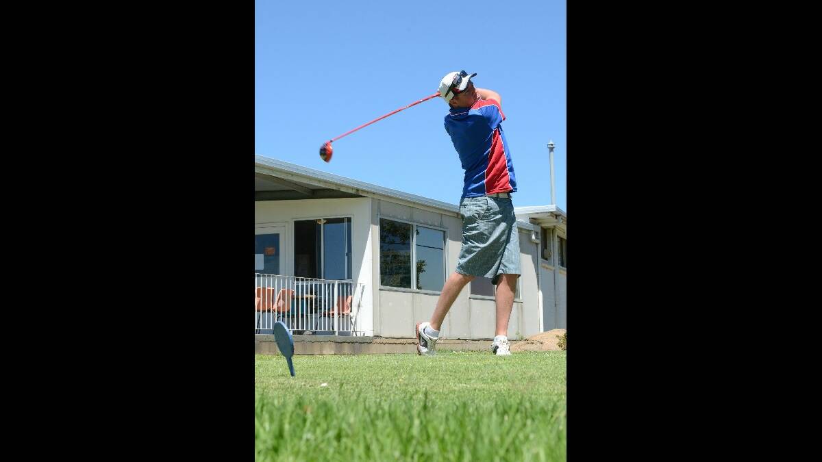 HIT IT: Young Fire and Rescue NSW firefighter Ryan Terry shows us his golfing skills.