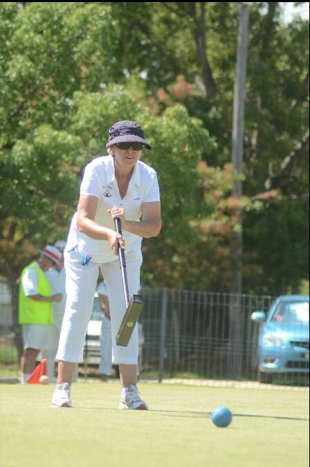 CONCENTRATION: Kaye Moffat of Albury analyses her next shot.  