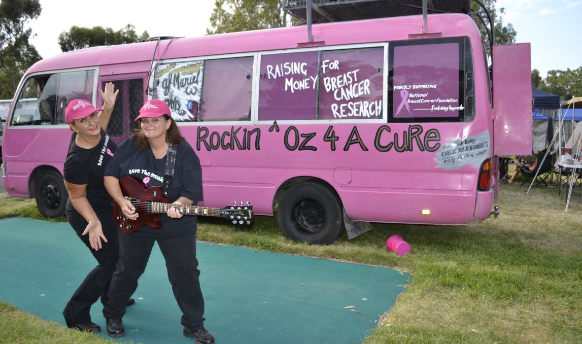 BUSTING OUT: AJ Muriel and Mavis - in their hot pink “boobie” bus - are bringing their free “Busted Out” show to Koorawatha tomorrow night in a bid to raise much needed funds for breast cancer research.    