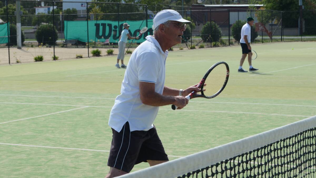 CONCENTRATE: Ric Hingee of Canberra travelled to Young as part of a regular social comp at the Young Tennis Club.   	