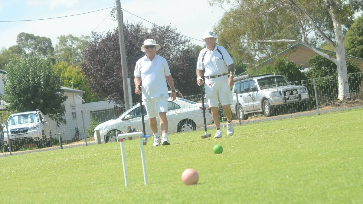 GAME: John James from Deniliquin and Derrick Christopher from Wollongong during their singles match at Jack Bond Field.
