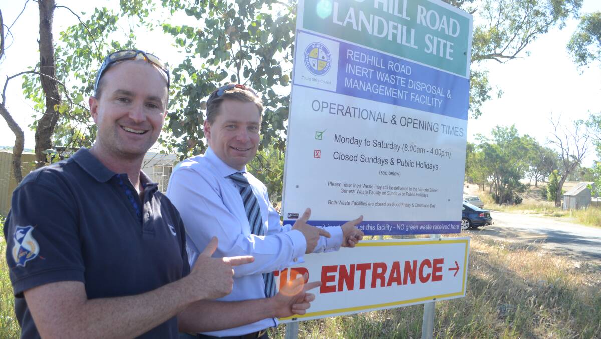 ROUND-UP: Young Tidy Towns president Keith Duran and committee member Ben Cooper are calling on locals to take advantage of the free entry at Red Hill Tip this Sunday and clean-out their homes. 