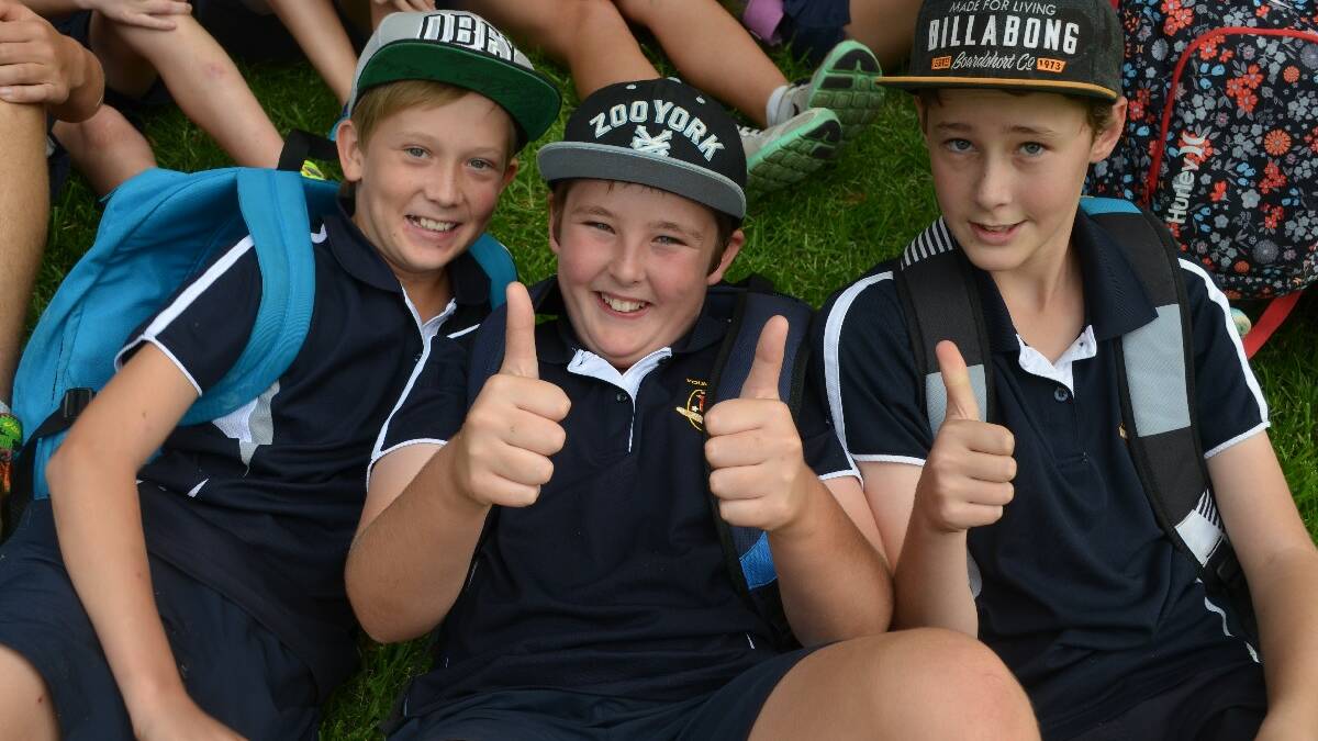 THUMBS UP: Young High School Year 7 students Cooper Silk, Jackson Skillin and Josh Debusch gave the barbecue the thumbs up.