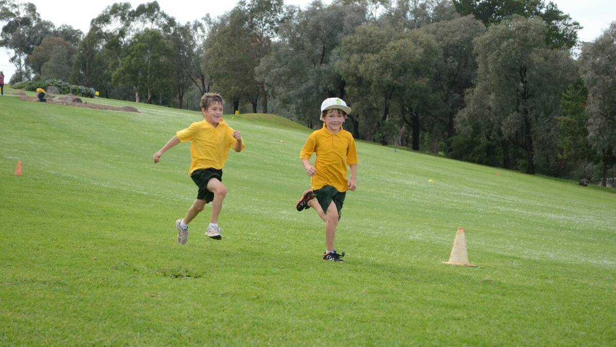 CATCH ME IF YOU CAN! These two youngsters from Year 3, Hudson Hargraves and Seth Dawes, had fun trying to outrun one another yesterday. 