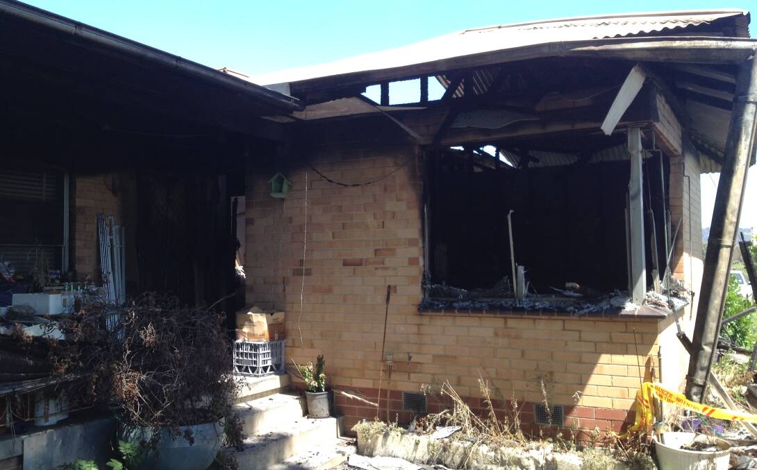 DESTROYED: The charred remnants of the South Albury house on Willowbank Road on November 13 last year. The fire started in a bedroom. 