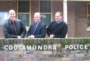 NEW DETECTIVE: Senior Constables Aaron Walker (left) and Glen Keane (right) are helping Cootamundra Local Area Command’s latest addition to the team, Detective Senior Constable Mark Lake (centre), find his bearings in a rural command.   			(sub)