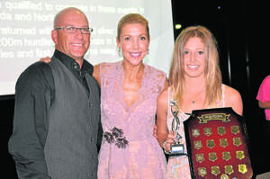 JUNIOR SPORTSPERSON 2011: Dave Quigley and Catriona Rowntree awarded well deserving athletics representative Caitlin Silk her Junior Sportsperson of the Year honour at last Thursday’s Annual Sports Council Presentation Dinner.