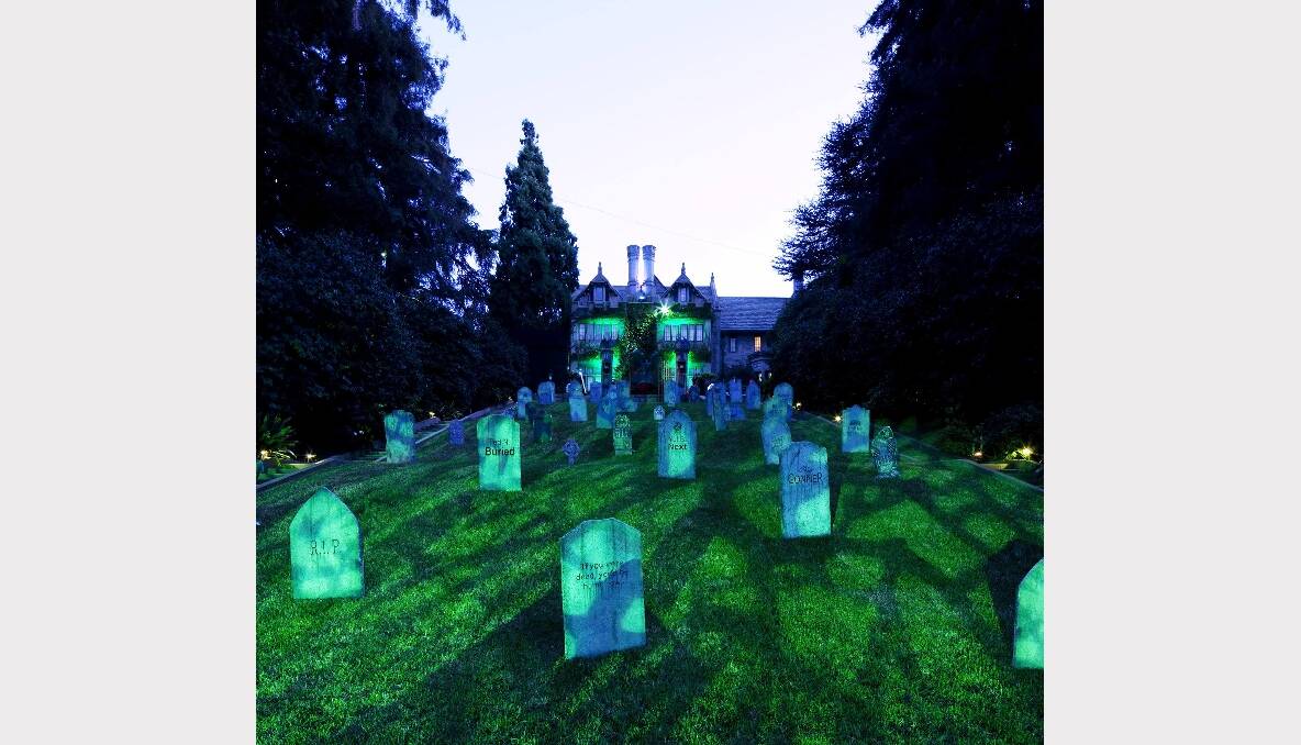 Tombstones sit out the front of the Playboy Mansion in Los Angeles. Photo: REUTERS